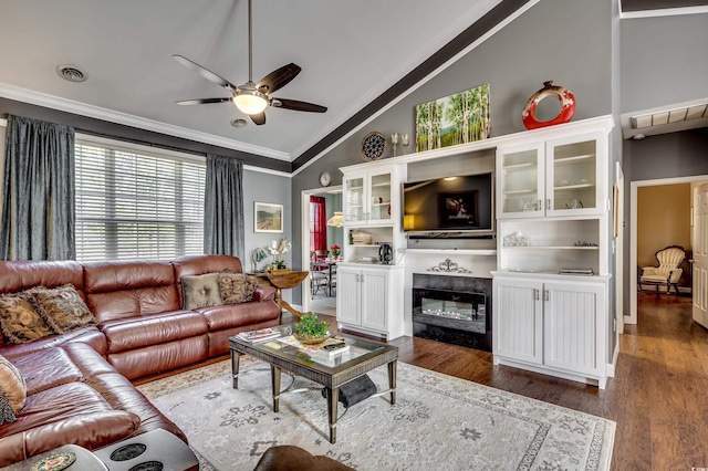 living room featuring lofted ceiling, crown molding, dark hardwood / wood-style floors, and ceiling fan