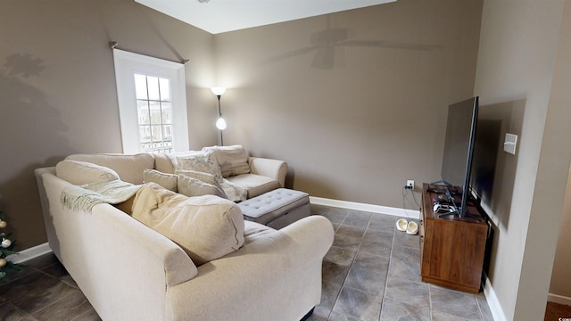 living room featuring ceiling fan