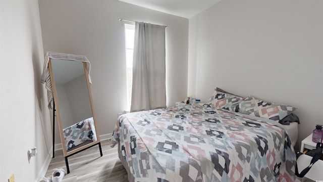 bedroom featuring light wood-type flooring