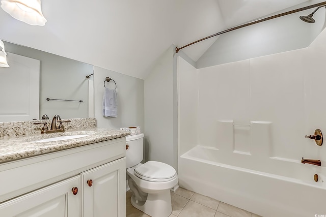 full bathroom featuring tile patterned flooring, lofted ceiling, toilet, shower / washtub combination, and vanity