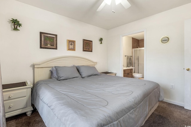 carpeted bedroom with ensuite bath and ceiling fan