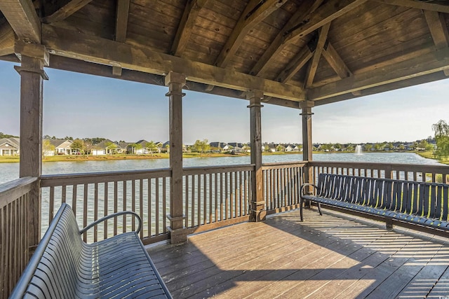 wooden terrace with a water view