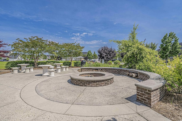 view of patio / terrace with an outdoor fire pit