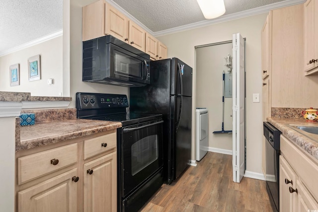 kitchen featuring black appliances, crown molding, hardwood / wood-style flooring, a textured ceiling, and light brown cabinetry