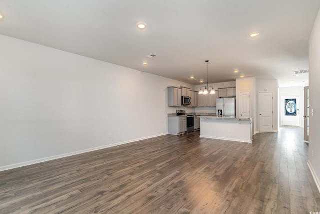 unfurnished living room featuring dark wood-type flooring