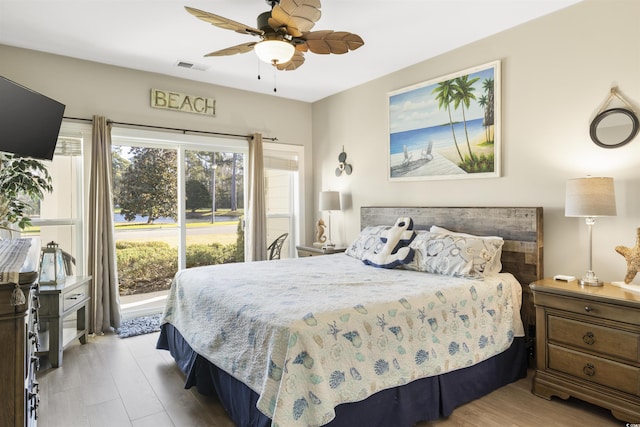 bedroom featuring ceiling fan and light wood-type flooring