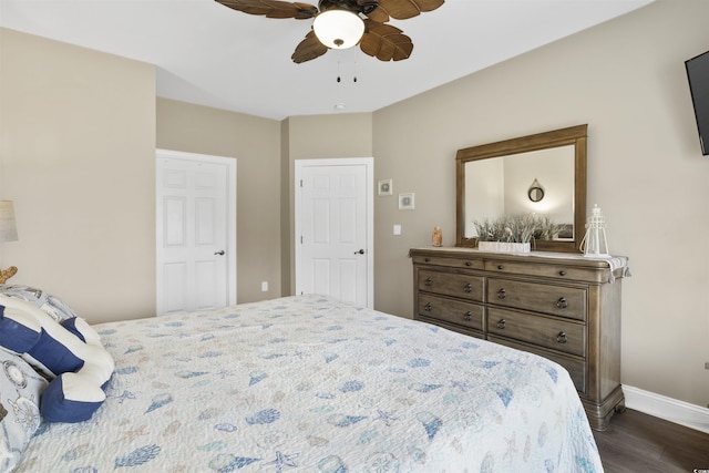 bedroom featuring dark hardwood / wood-style floors and ceiling fan