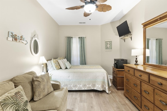 bedroom featuring light hardwood / wood-style flooring and ceiling fan