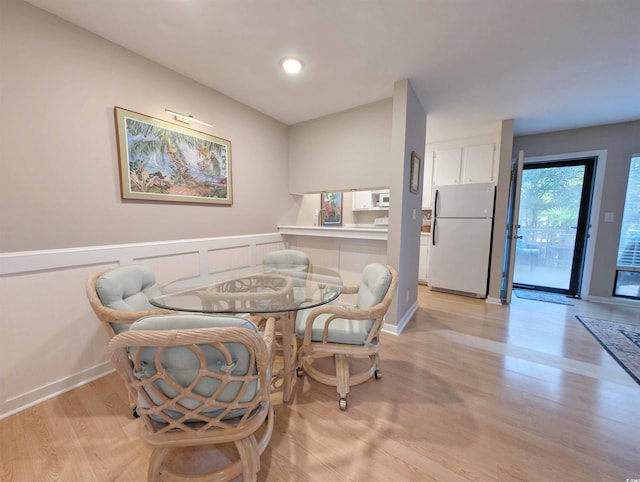 dining room featuring light hardwood / wood-style floors