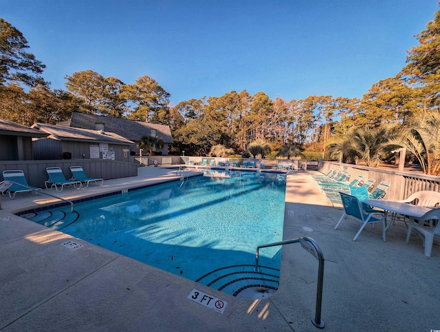 view of pool featuring a patio area