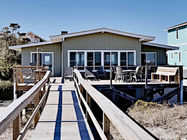 view of dock featuring a wooden deck