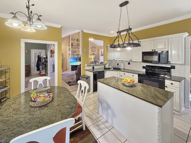 kitchen featuring black appliances, white cabinets, sink, hanging light fixtures, and light tile patterned floors