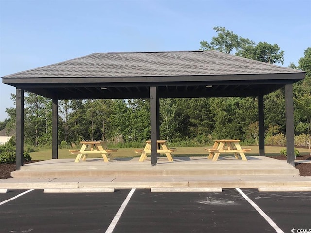 view of parking with a gazebo