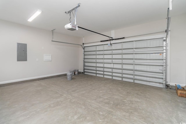 garage featuring electric panel and a garage door opener