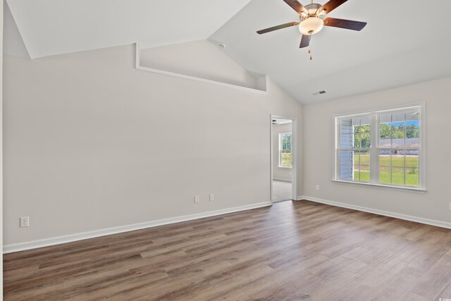 399 Lifestyle Ct, Surfside Beach, SC 29575 - unfurnished room with hardwood / wood-style flooring, ceiling fan, and vaulted ceiling