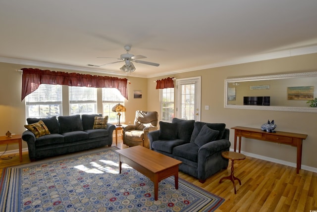 living room with ceiling fan, hardwood / wood-style floors, and crown molding