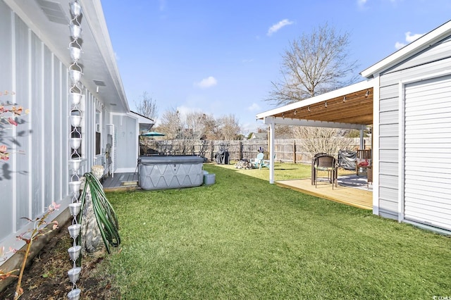 view of yard with a pool side deck