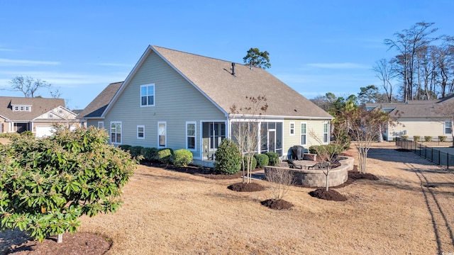 1405 Osprey Pointe Ln, North Myrtle Beach, SC 29582 - rear view of house with roof with shingles