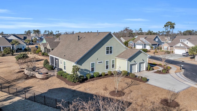 back of property with a garage