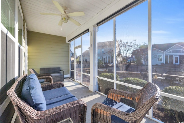 sunroom / solarium with ceiling fan