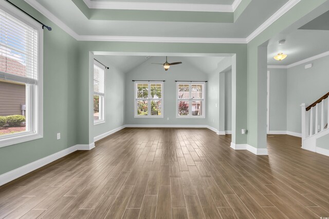 1405 Osprey Pointe Ln, North Myrtle Beach, SC 29582 - unfurnished room featuring dark wood finished floors, ceiling fan, stairs, vaulted ceiling, and a smoke detector