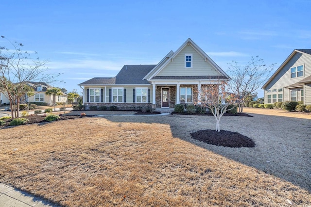 craftsman-style house featuring covered porch