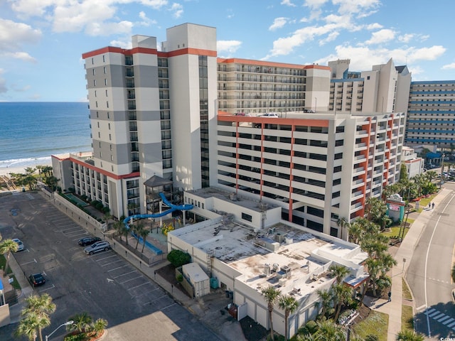 view of building exterior with a water view