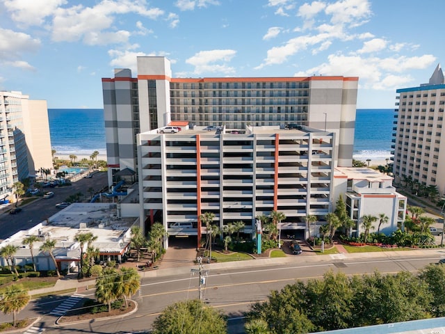 view of building exterior featuring a water view