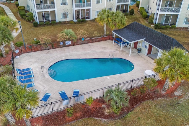 view of swimming pool featuring a patio