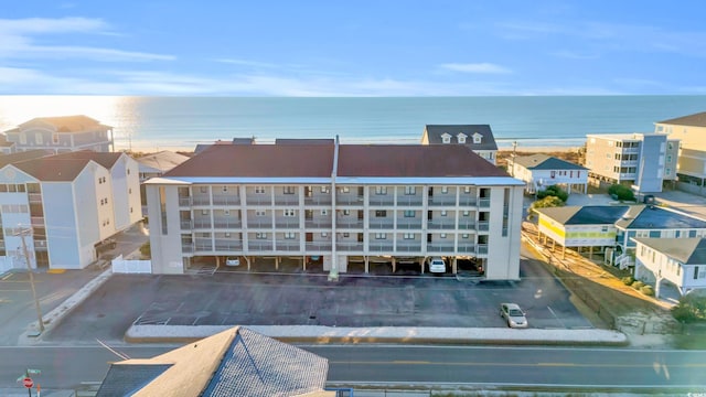 view of building exterior featuring a water view