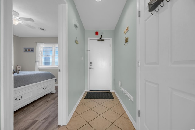 interior space featuring ceiling fan