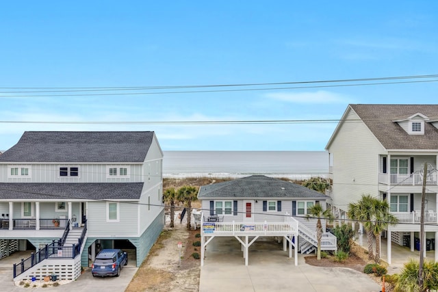 view of front of house featuring a water view