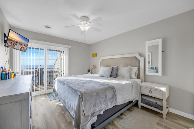 bedroom with light wood-type flooring, access to outside, and ceiling fan