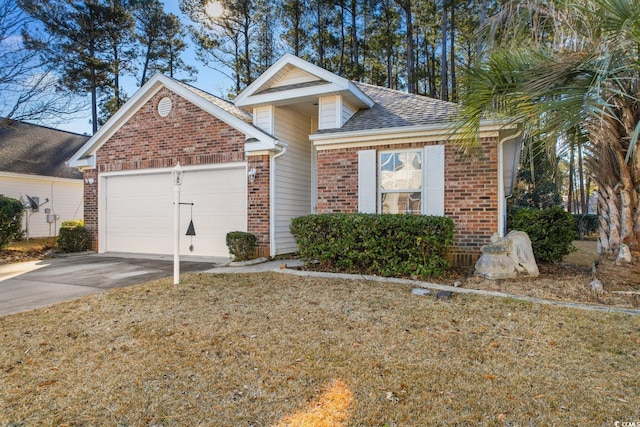 view of front facade featuring a front yard and a garage