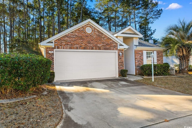 view of front of property with a garage