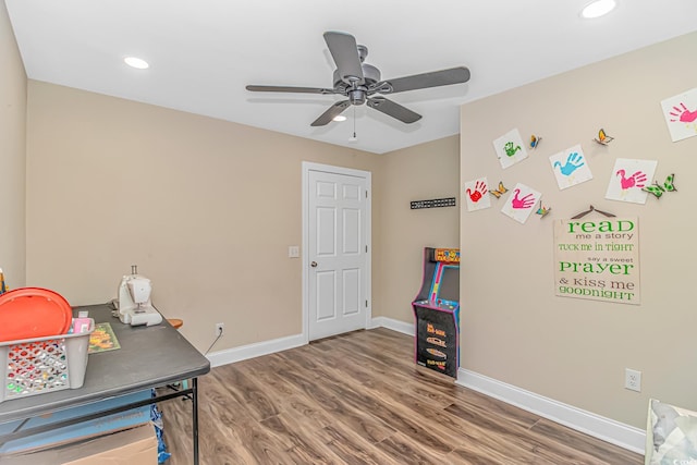 office space featuring ceiling fan and hardwood / wood-style floors