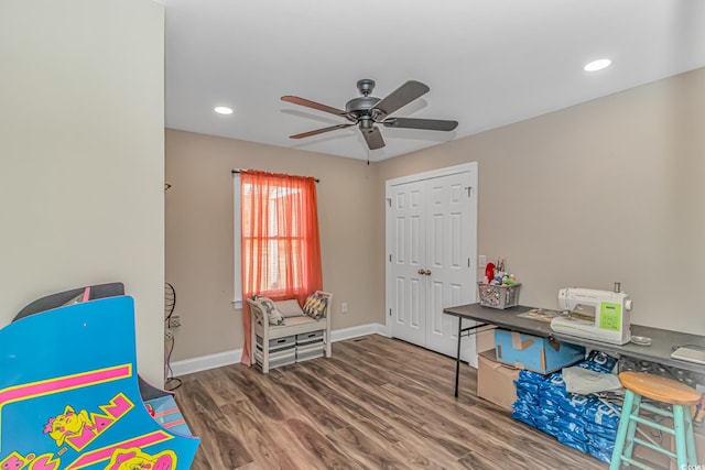 rec room featuring ceiling fan and hardwood / wood-style floors