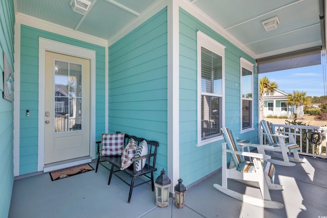 property entrance featuring covered porch