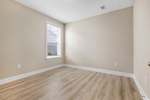 empty room with light wood-type flooring