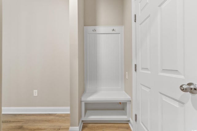 mudroom with light hardwood / wood-style floors