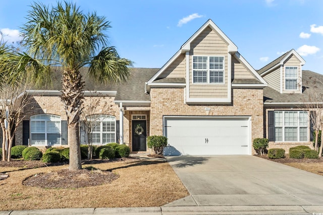 view of front of home with a garage