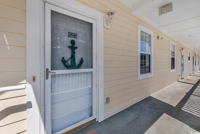 entrance to property with a porch