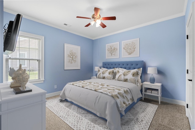 bedroom featuring ceiling fan, light colored carpet, and ornamental molding