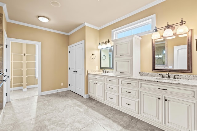 bathroom featuring vanity and ornamental molding