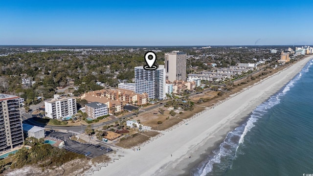 bird's eye view with a view of the beach and a water view