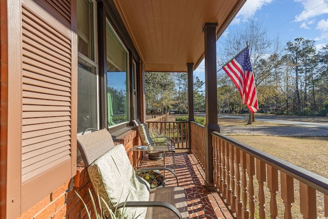 balcony featuring covered porch