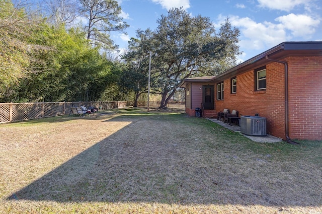 view of yard featuring central AC