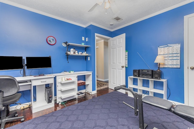 office with a textured ceiling, dark hardwood / wood-style floors, ceiling fan, and ornamental molding