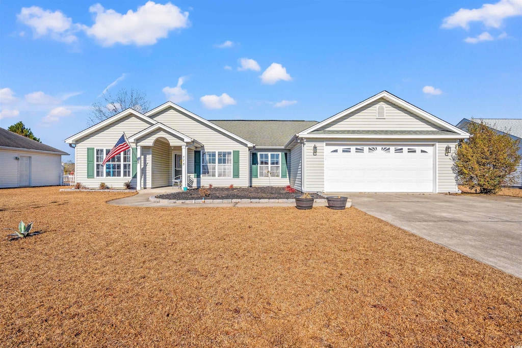 ranch-style home with a garage