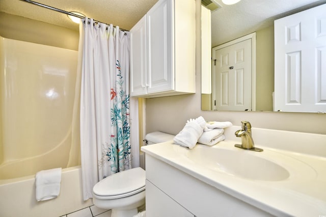 full bathroom featuring tile patterned floors, a textured ceiling, toilet, vanity, and shower / tub combo